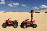 ATV on white sand dunes