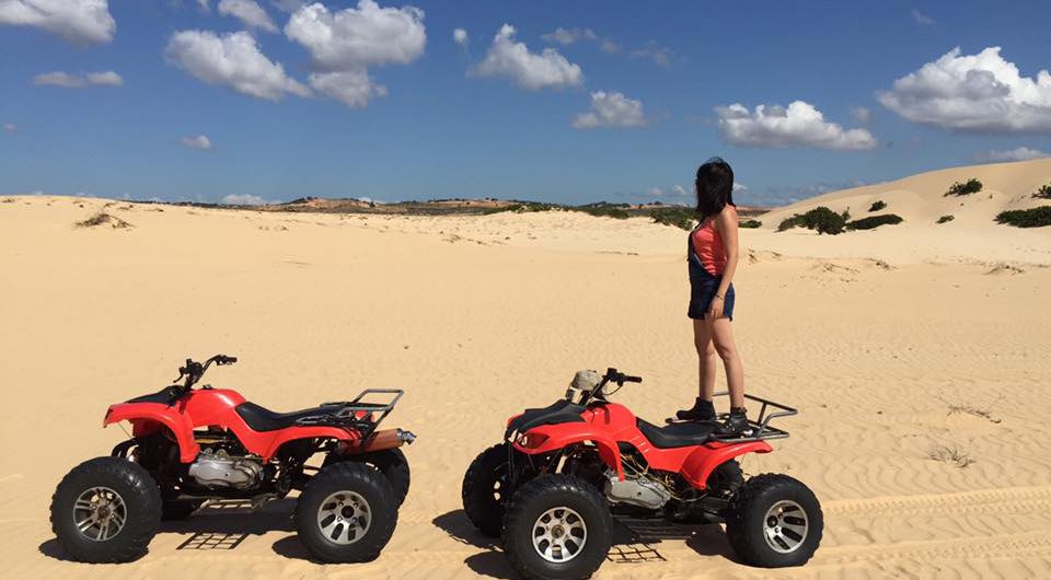 ATV on white sand dunes