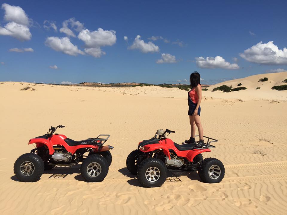 ATV on white sand dunes